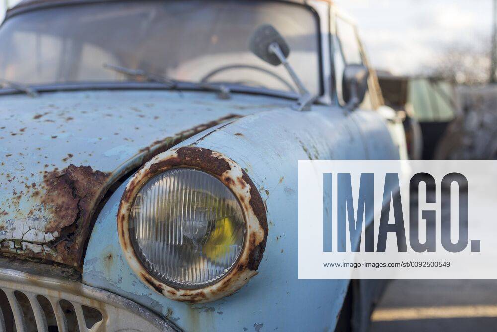 Rusty car in a scrapyard JPTF00079