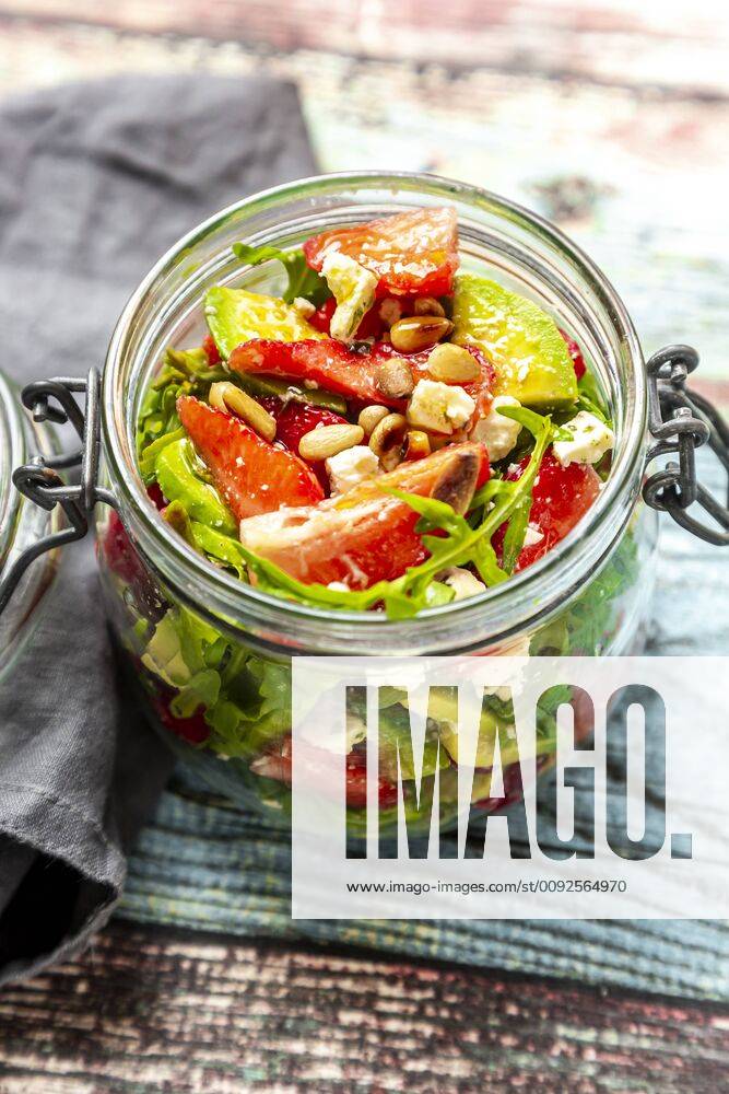 Strawberry avocado salad with feta, rocket and pine nuts in jar SARF04297