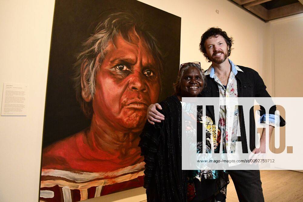 ARCHIBALD PEOPLE?S CHOICE AWARD, Aboriginal Elder Daisy Tjuparntarri Ward (left) and artist David Darcy pose for a photograph in front of David s portrait of Daisy at the Art Gallery of NSW in Sydney, Wednesday, August 14, 2019. David Darcy s portrait of Daisy, Tjuparntarri - Women s Business , has won the 2019 Archibald People s Choice award. ( NO ARCHIVING, , NO USE IN BOOKS WITHOUT CONSENT SYDNEY NSW AUSTRALIA