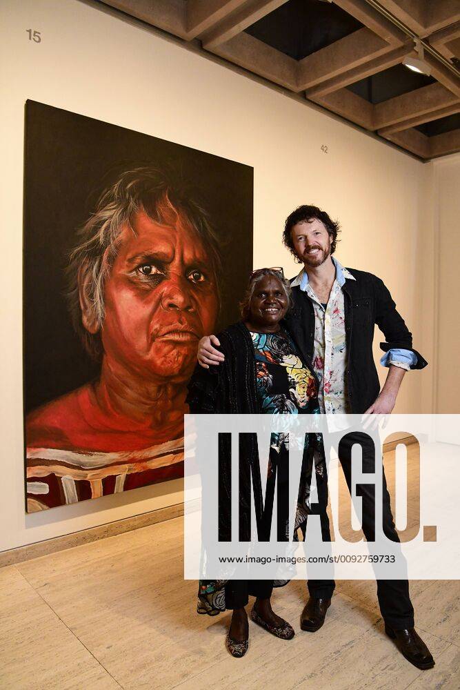 ARCHIBALD PEOPLE?S CHOICE AWARD, Aboriginal Elder Daisy Tjuparntarri Ward (left) and artist David Darcy pose for a photograph in front of David s portrait of Daisy at the Art Gallery of NSW in Sydney, Wednesday, August 14, 2019. David Darcy s portrait of Daisy, Tjuparntarri - Women s Business , has won the 2019 Archibald People s Choice award. ( NO ARCHIVING, , NO USE IN BOOKS WITHOUT CONSENT SYDNEY NSW AUSTRALIA