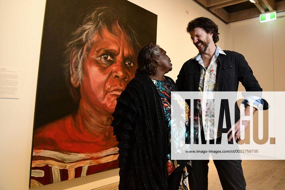 ARCHIBALD PEOPLE?S CHOICE AWARD, Aboriginal Elder Daisy Tjuparntarri Ward (left) and artist David Darcy pose for a photograph in front of David s portrait of Daisy at the Art Gallery of NSW in Sydney, Wednesday, August 14, 2019. David Darcy s portrait of Daisy, Tjuparntarri - Women s Business , has won the 2019 Archibald People s Choice award. ( NO ARCHIVING, , NO USE IN BOOKS WITHOUT CONSENT SYDNEY NSW AUSTRALIA