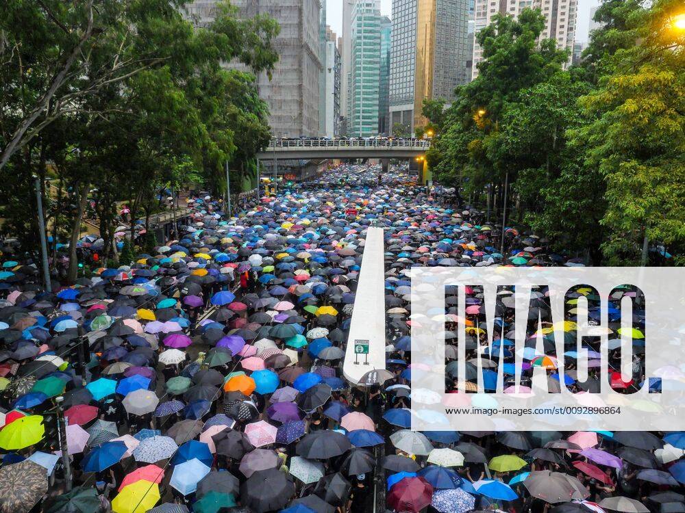 A massive crowd of protesters under umbrellas leave an anti-government rally in Hong Kong s Victoria Park on August 18, 2019. Organizers estimated 1.7 million people turned out for the demonstration. HON2019081812 THOMASxMARESCA