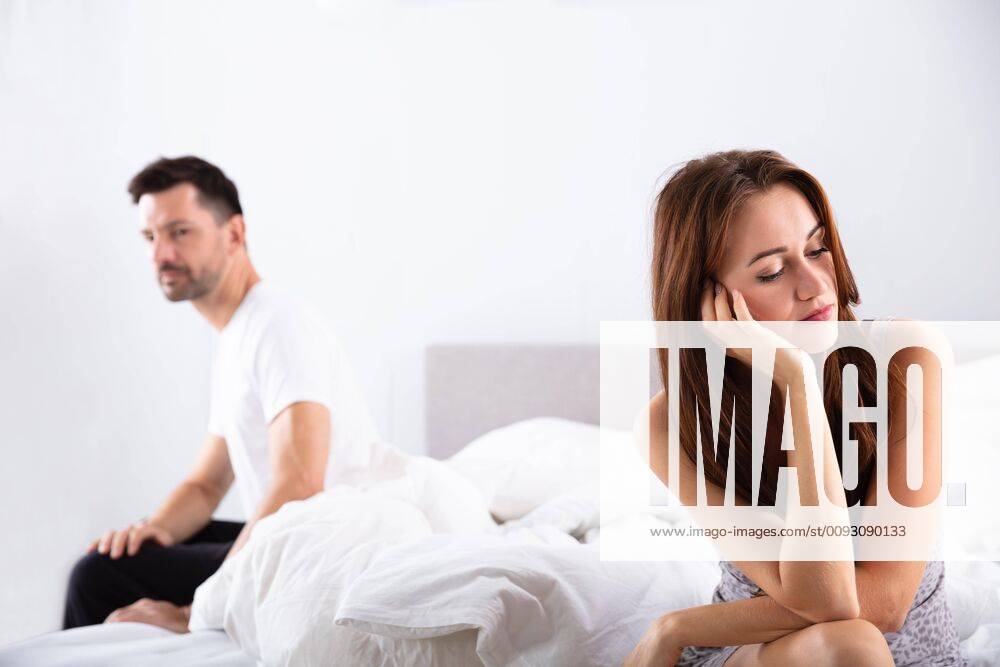 Depressed Woman Sitting On Bed ,model released, Symbolfoto