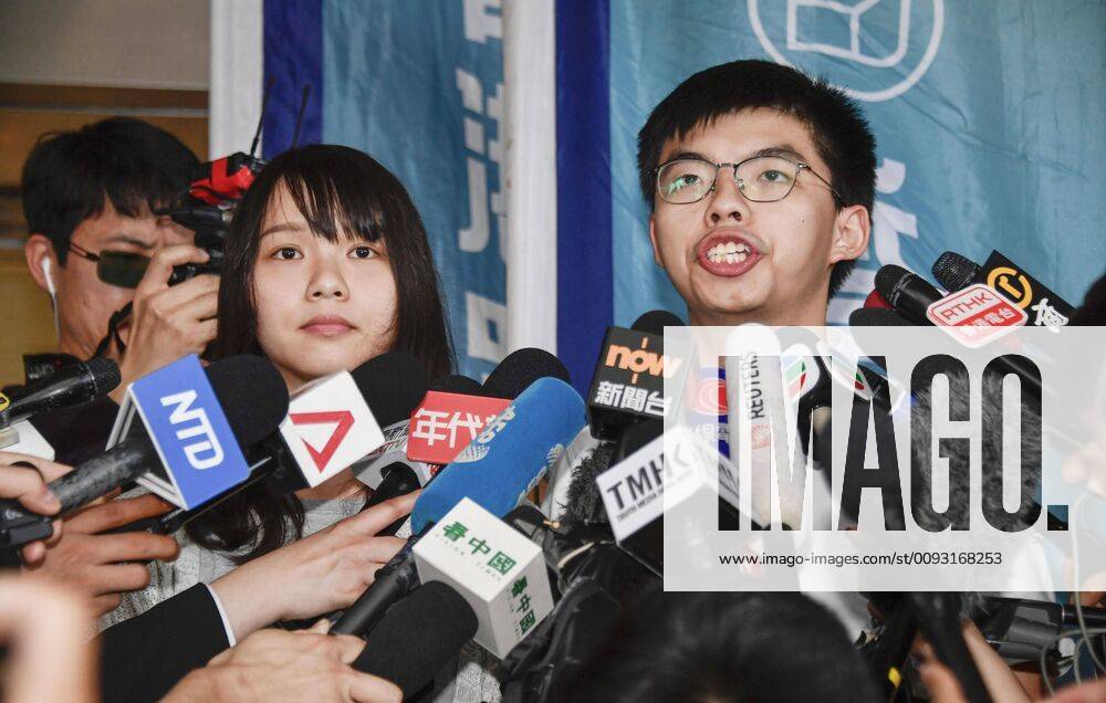 Hong Kong democracy activists Democracy activists Joshua Wong (R) and Agnes Chow meet the press in Hong Kong on Aug. 30, 2019, after being released. The two were arrested earlier in the day for allegedly inciting and organizing an unlawful assembly in June, according to local media.