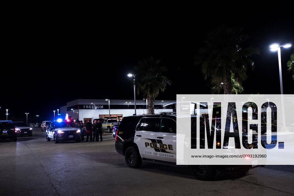 Crime tape blocks off an area at a dealership where a gunman opened fire in Odessa, Texas. The gunman, who hijacked a U.S. Postal Service van, drove through the towns of Midland and Odessa fatally shooting five people and wounding 21 others earlier in the day. Odessa USA - ZUMAj106 20190831_zap_j106_001