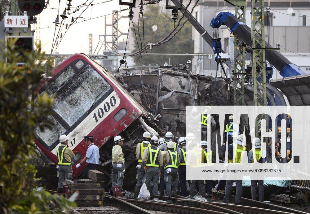 Train crash in Yokohama Operations are underway to clear the tracks to resume service on the Keikyu commuter train line in Yokohama, near Tokyo, on the morning of Sept. 6, 2019, after a passenger train collided with a truck the previous day.