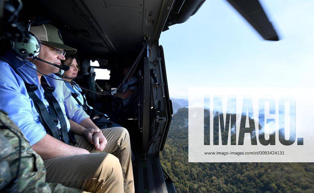 SCOTT MORRISON QUEENSLAND BUSHFIRES, Australian Prime Minister Scott Morrison and wife Jenny look on to the bushfire affected suburb of Binna Burra in the Gold Coast Hinterland, Friday, September 13, 2019. Bushfires claimed scores of homes in Queensland and New South Wales earlier this week with warm and dry conditions and a southerly wind change increasing fire danger in coming days. ( NO ARCHIVING, , NO USE IN BOOKS WITHOUT CONSENT GOLD COAST QLD AUSTRALIA