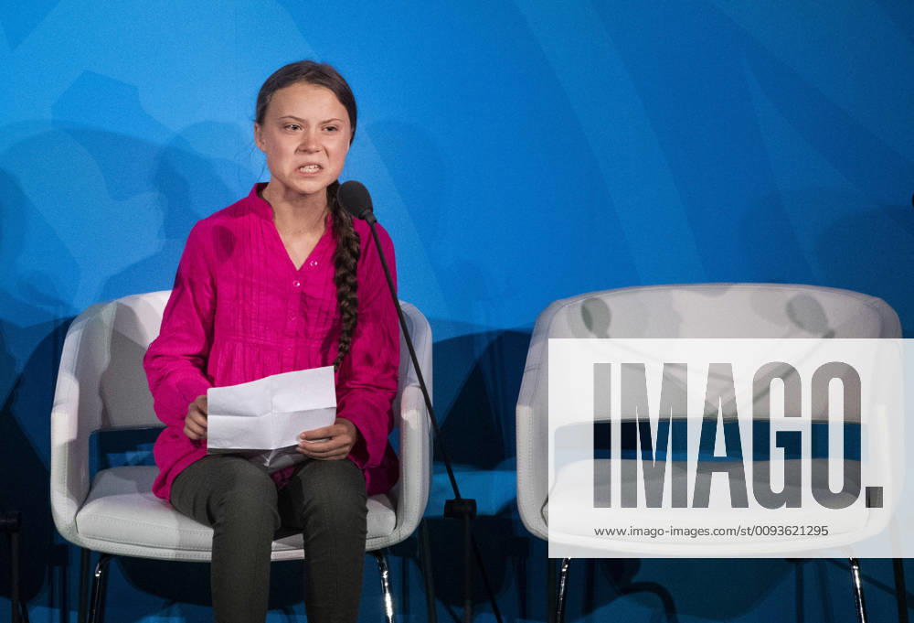 NEW YORK 2019 09 23 Climate activist Greta Thunberg R speaks at the Climate Action Summit at the United Nations on September 23, 2019 in New York City NEW YORK USA