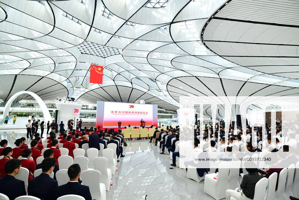 KW39 BEIJING, CHINA - SEPTEMBER 25: People attend the Beijing Daxing International Airport Launching Ceremony on September 25, 2019 in Beijing, China. Chinese President Xi Jinping announced the official opening of the Beijing Daxing International Airport on Wednesday.