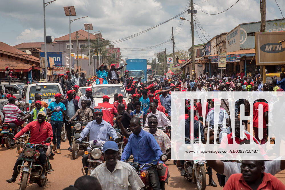 Bobi Wine, aka Robert Kyagulanyi, is being driven through the streets while campaigning in Hoima..Wine aka Robert Kyagulanyi, campaigned in Hoima ahead of a by-election. It was the first time the musician and presidential candidate with the Uganda s long-serving president Yoweri Kaguta Museveni, campaigned at the same area since Wine was arrested and tortured by security forces in August 2018. Hoima Uganda - ZUMAs197 20190925_zaa_s197_025