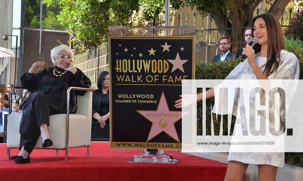 Italian screenwriter and director Lina Wertmuller is joined by her daughter Maria Zulima Job (L) and Alessandro Santoni during an unveiling ceremony honoring Wertmuller with the 2,679th star on the Hollywood Walk of Fame in Los Angeles on Monday, October 28, 2019. LAP2019102802 JIMxRUYMEN