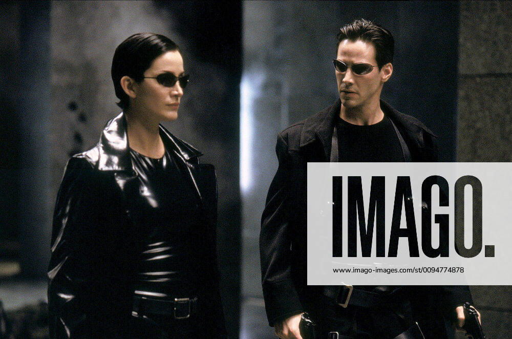 Carrie-Anne Moss & Keanu Reeves Characters: Trinity, Neo Film: The Matrix (USA AUS 1999) Director: The Wachowski Brothers 31 March 1999
