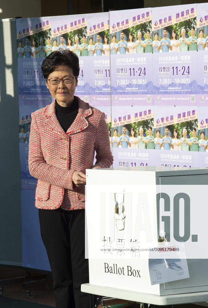 Hong Kong Chief Executive, CARRIE LAM, votes in the local council elections. Lam meets the press at Raymond College in Midlevels Central to cast her vote in an election predicted to show Hong Kongers true views following 5 months of protests. Hong Kong China - ZUMAr144 20191124_zap_r144_011