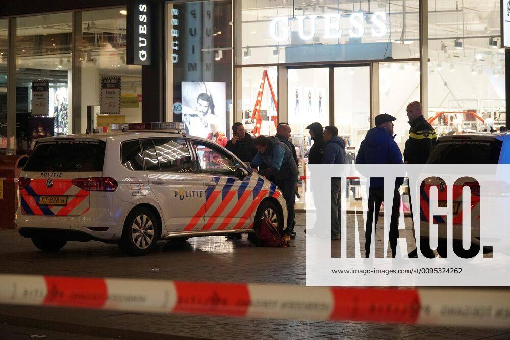 Police vehicles are seen at the site where three people were injured in a stabbing in the Grote Marktstraat in The Hague, The Netherlands, 29 November 2019. Three injured in a stabbing in The Hague !ACHTUNG: NUR REDAKTIONELLE NUTZUNG!