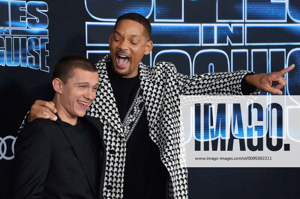 Cast members Tom Holland (L) and Will Smith attend the premiere of the animated motion picture Spies in Disguise at the El Capitan Theatre in the Hollywood section of Los Angeles on Wednesday, December 4, 2019. Storyline: When the world s best spy is turned into a pigeon, he must rely on his nerdy tech officer to save the world. LAP2019120416 JIMxRUYMEN