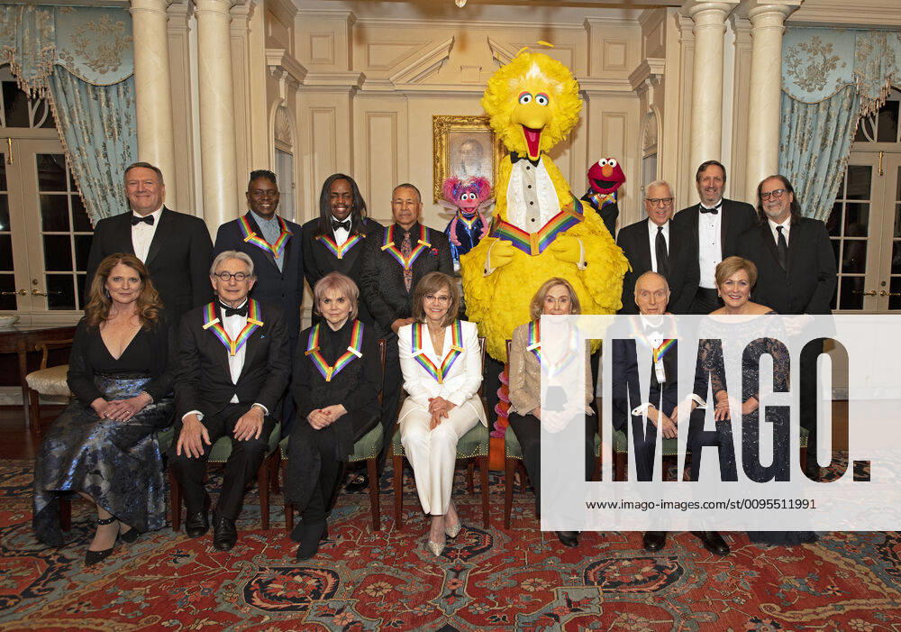 The recipients of the 42nd Annual Kennedy Center Honors pose for a group photo following a dinner at the United States Department of State in Washington, D.C. on Saturday, December 7, 2019. From left to right back row: from the band Earth, Wind & Fire, singer Philip Bailey, bassist Verdine White, and percussionist Ralph Johnson; from Sesame Street, Abby, Big Bird, and Elmo. Front row, left to right: Michael Tilson Thomas; Linda Ronstadt; Sally Field; Sesame street founders Joan Ganz Cooney and Dr. Lloyd Morrisett. The 2019 honorees are: Earth, Wind & Fire, Sally Field, Linda Ronstadt, Sesame Street, and Michael Tilson Thomas..Credit: Ron Sachs Pool via CNP WAX20191207262 RONxSACHS