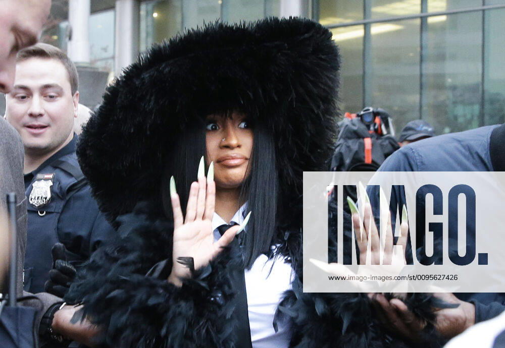 Cardi B exits Queens County Criminal Court in New York City on Tuesday, December 10, 2019. The 26-year-old is accused of throwing bottles and chairs at two bartenders at Angels Strip Club in Flushing back in August of 2018. NYP20191210107 JOHNxANGELILLO