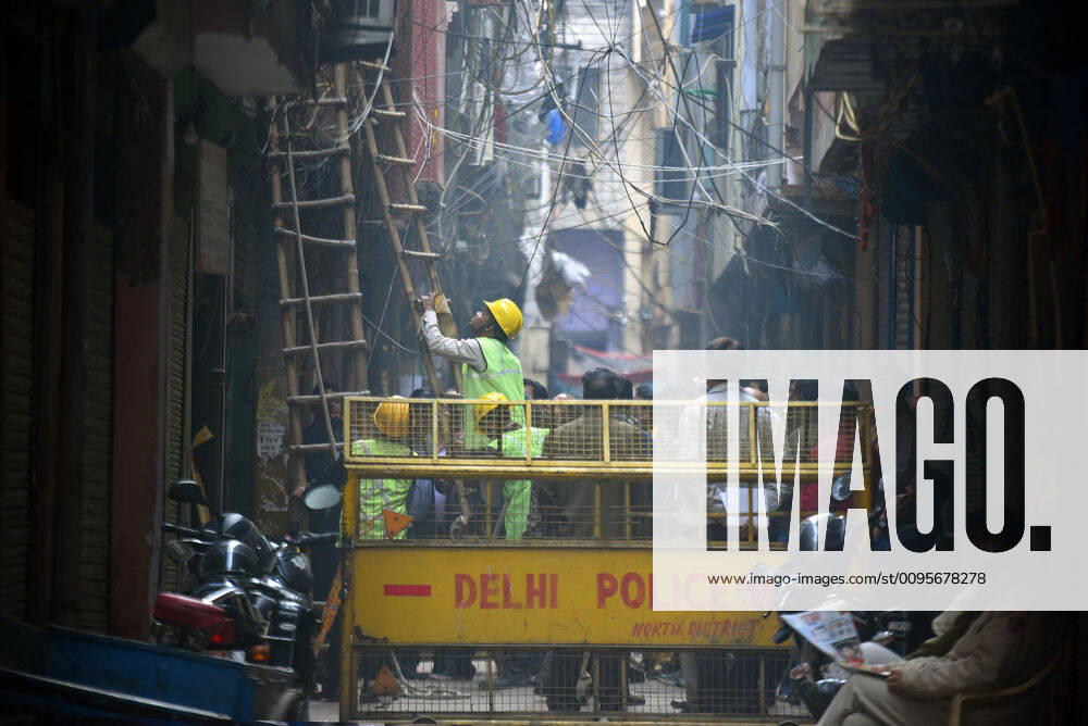 NEW DELHI, INDIA DECEMBER 11: A BSES team outside the factory where a fire broke out on Sunday killing 43 people at Anaj Mandi, Filmistan, on December 11, 2019 in New Delhi, India. The three municipal corporations of Delhi Wednesday sealed 45 illegal factories operating out of residential areas, including two on Chamelian Road, next to Anaj Mandi in Old Delhi, where a fire had killed 43 people on Sunday. They have a deadline to seal over 9,000 illegal factories in areas such as Hauz Rani, Said-ul-Ajab, Badarpur, Shastri Nagar, Inderlok, Karampura, Seelampur, Jaffrabad by December 31. (Photo by Amal KS Hindustan Times ) MCD Holds A Sealing Drive Against Illegal Factories After 43 Killed In Massive Fire In Delhi s Anaj Mandi