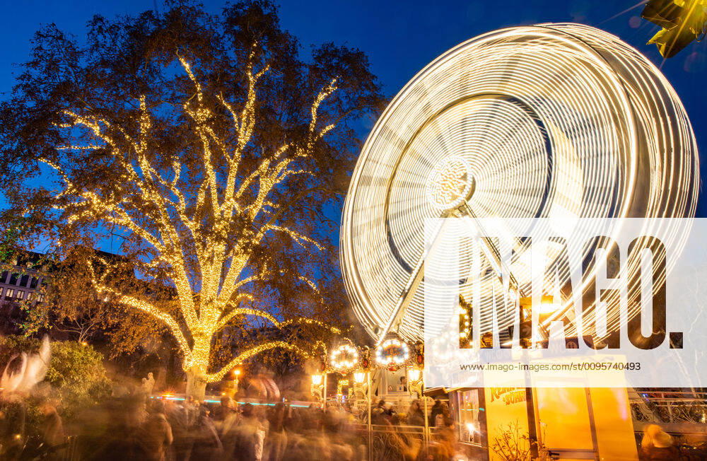 (191215) -- VIENNA, Dec. 15, 2019 -- Photo taken on Dec. 15, 2019 shows the illuminated ferris wheel at the Christmas market on the Rathausplatz in Vienna, Austria. As one of the oldest and most famous Christmas markets in Europe, the Christmas market at Rathausplatz in Vienna attracts a large number of local residents and tourists every year during the holiday season. ) AUSTRIA-VIENNA-CHRISTMAS MARKET GuoxChen
