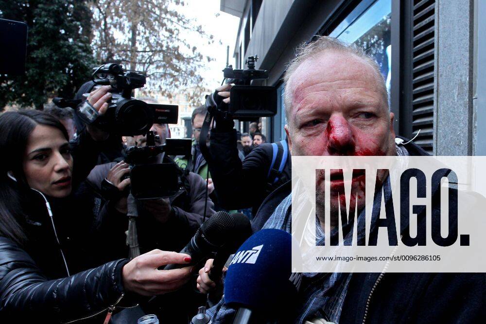 Nationalists beat a Deutsche Welle cameraman Thomas Jacobi during protest against refugees and migrants at Syntagma square in the center of Athens. Greek nationalists demand the borders be closed for refugees and migrants. Athens Greece - ZUMAv62_ 20200119_zaf_v62_010