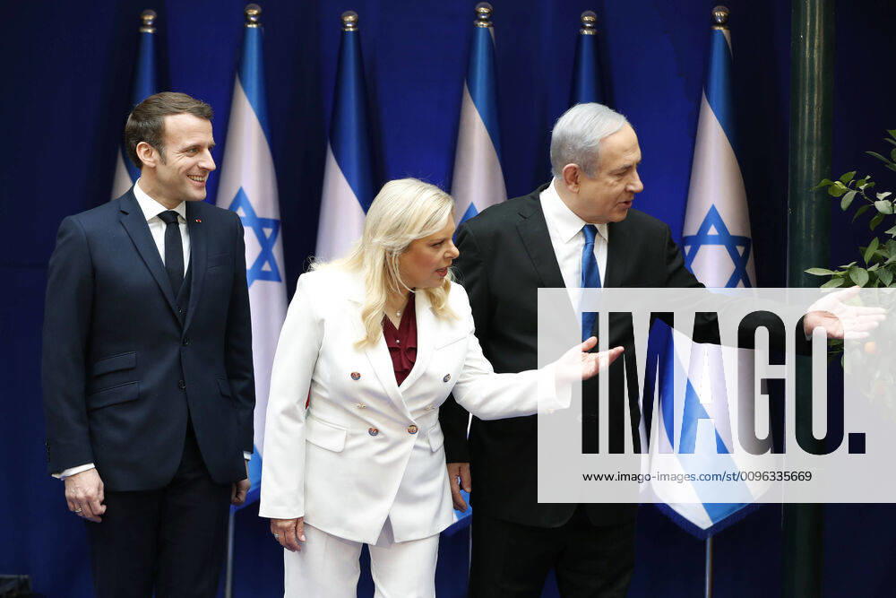 Israeli Prime Minister Benjamin Netanyahu and his wife Sara gesture as they meet French President Emmanuel Macron in Jerusalem on Wednesday, January 22, 2020. Macron is on a two trip to Israel and the West Bank to discuss the Iran tensions and the Palestinian peace process. Pool JERX20200121103 RONENxZVULUN