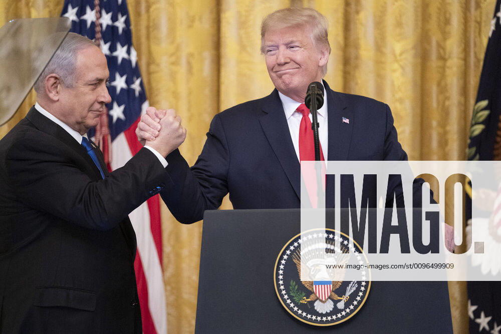 President DONALD TRUMP listens as Israeli Prime Minister BENJAMIN NETANYAHU addresses his remarks Tuesday, Jan. 28, 2020, in the East Room of the White House, during the unveiling of the Trump administration s Middle East Peace Plan. Washington U.S. - ZUMAz03_ 20200128_sha_z03_193