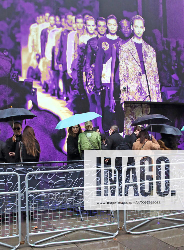 People holding umbrellas outside the BFC Showspace during the London Fashion Week autumn winter 2020. London United Kingdom - ZUMAs197 20200215_zaa_s197_107