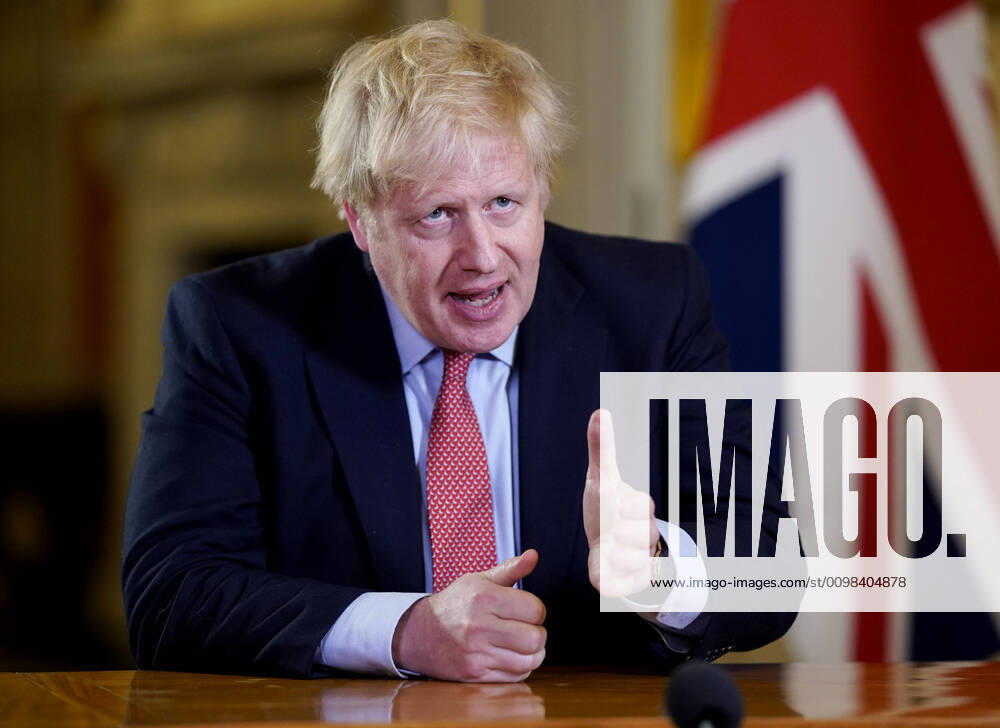 (200323) -- LONDON, March 23, 2020 (Xinhua) -- British Prime Minister Boris Johnson addresses the nation at 10 Downing Street in London, Britain, on March 23, 2020. British Prime Minister Boris Johnson announced Monday evening a series of measures that aim to restrict social contact in the UK, so as to curb the spread of COVID-19. (Andrew Parsons No 10 Downing Street Handout via Xinhua) () BRITAIN-LONDON-PM-COVID-19-ADDRESS