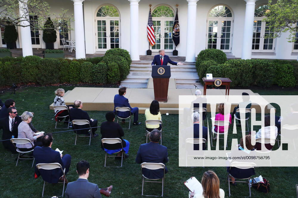 Media members observe social distancing as US President DONALD J. TRUMP speaks during the Coronavirus Task Force press briefing on the coronavirus and COVID-19 pandemic, in the Rose Garden at the White House. Washington USA - ZUMAs152 20200330_zaa_s152_054