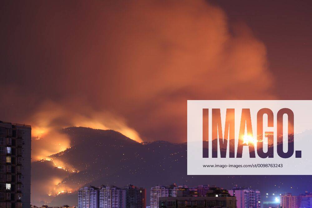 (200331) -- CHENGDU, March 31, 2020 (Xinhua) -- Photo taken on March 31, 2020 shows the scene of the forest fire in Xichang, southwest China s Sichuan Province. Nineteen people died while battling a forest fire in southwest China s Sichuan Province, local authorities said Tuesday. The victims include 18 firefighters and a local forest farm worker who led the way for the firefighters. They were trapped in fire due to a sudden change in wind direction at around 2 a.m. on Tuesday. (Photo by Liu Mingke Xinhua) CHINA-SICHUAN-FOREST FIRE(CN)