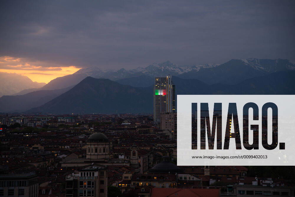 Italy: Turin lockdown 14th April 2020 A view shows the Grattacielo San Paolo with the colors of the Italian national flag to express solidarity and cohesion during COVID-19 emergencyon April 14, 2020 in Italy, during the c ountry s lockdown aimed at curbing the spread of the COVID-19 infection, caused by the novel coronavirus. Turin Piedmont Turin Italy