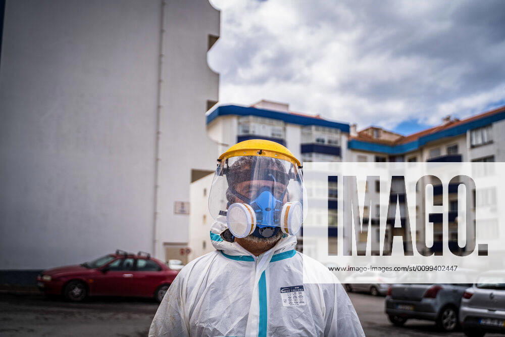 An employee of the Ericeira parish council is equipped with the recommended protective materials..The municipality of Mafra had 70 cases of COVID-19 pandemic. In order to prevent the spread of the virus, the Ericeira Parish Council perform weekly street disinfection. Ericeira Portugal - ZUMAs197 20200414_zaa_s197_191