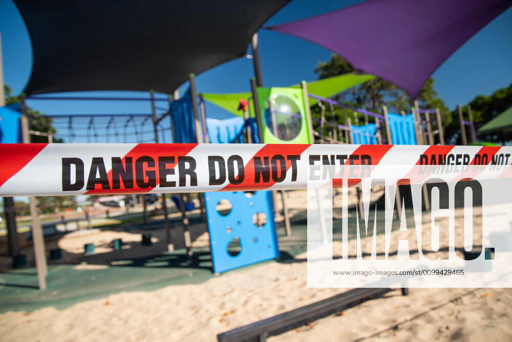 A playground closed with tape saying Danger Do Not Enter during Coronavirus crisis..Australian states including Queensland take strict new lockdown rules to stop the spread of Covid-19. Queensland Australia - ZUMAs197 20200416_zaa_s197_005