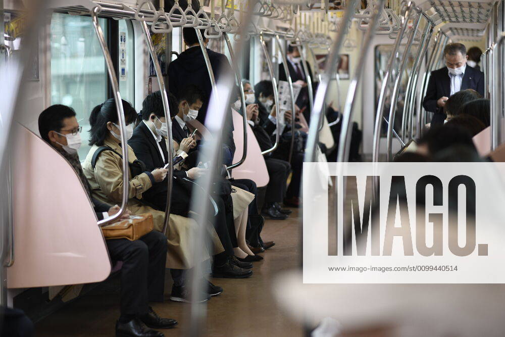 Commuters wearing face mask head to work early morning inside of JR Yamanote train in Tokyo on Friday, April 17, 2020. The Japanese government decided to expand the current areas under a state of emergency to nationwide, as the Covid-19 coronavirus outbreak continues to spread throughout the country. (Photo: Richard Atrero de Guzman AFLO) (125423237)
