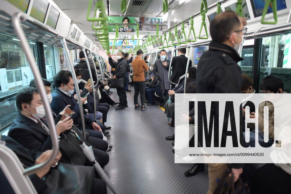 Commuters wearing face mask head to work early morning inside of JR Yamanote train in Tokyo on Friday, April 17, 2020. The Japanese government decided to expand the current areas under a state of emergency to nationwide, as the Covid-19 coronavirus outbreak continues to spread throughout the country. (Photo: Richard Atrero de Guzman AFLO) (125423366)