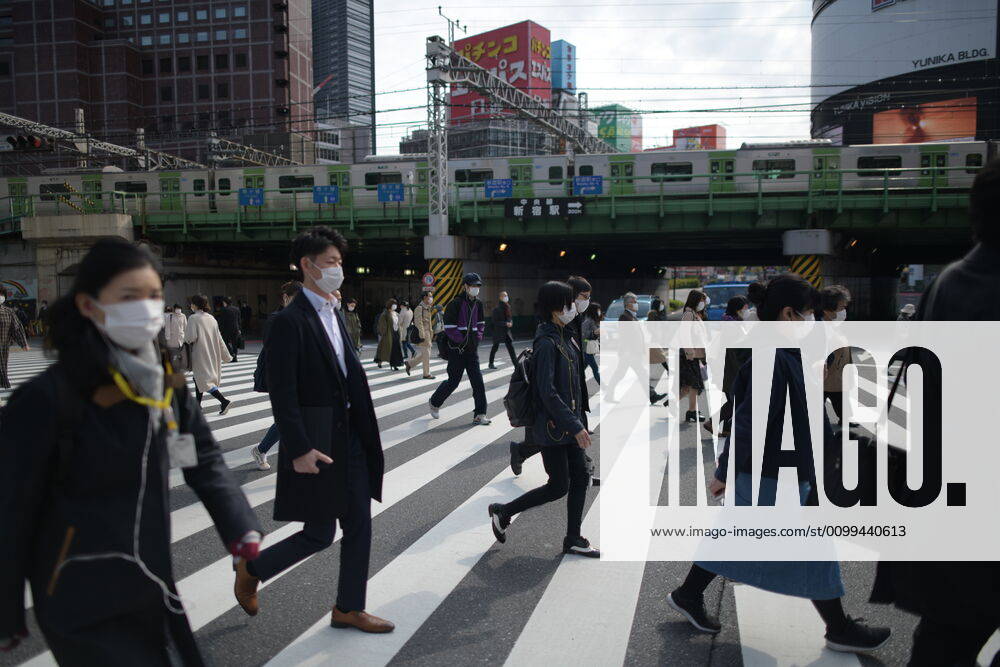 Commuters wearing face mask head to work early morning in Shinjuku, Tokyo on Friday, April 17, 2020. The Japanese government decided to expand the current areas under a state of emergency to nationwide, as the Covid-19 coronavirus outbreak continues to spread throughout the country. (Photo: Richard Atrero de Guzman AFLO) (125423443)