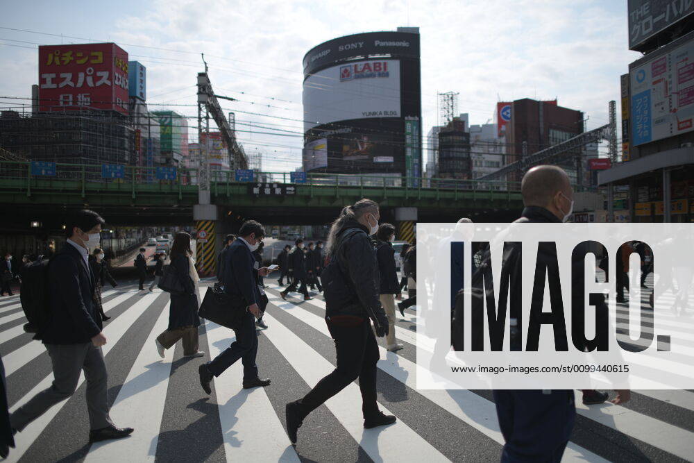 Commuters wearing face mask head to work early morning in Shinjuku, Tokyo on Friday, April 17, 2020. The Japanese government decided to expand the current areas under a state of emergency to nationwide, as the Covid-19 coronavirus outbreak continues to spread throughout the country. (Photo: Richard Atrero de Guzman AFLO) (125423649)