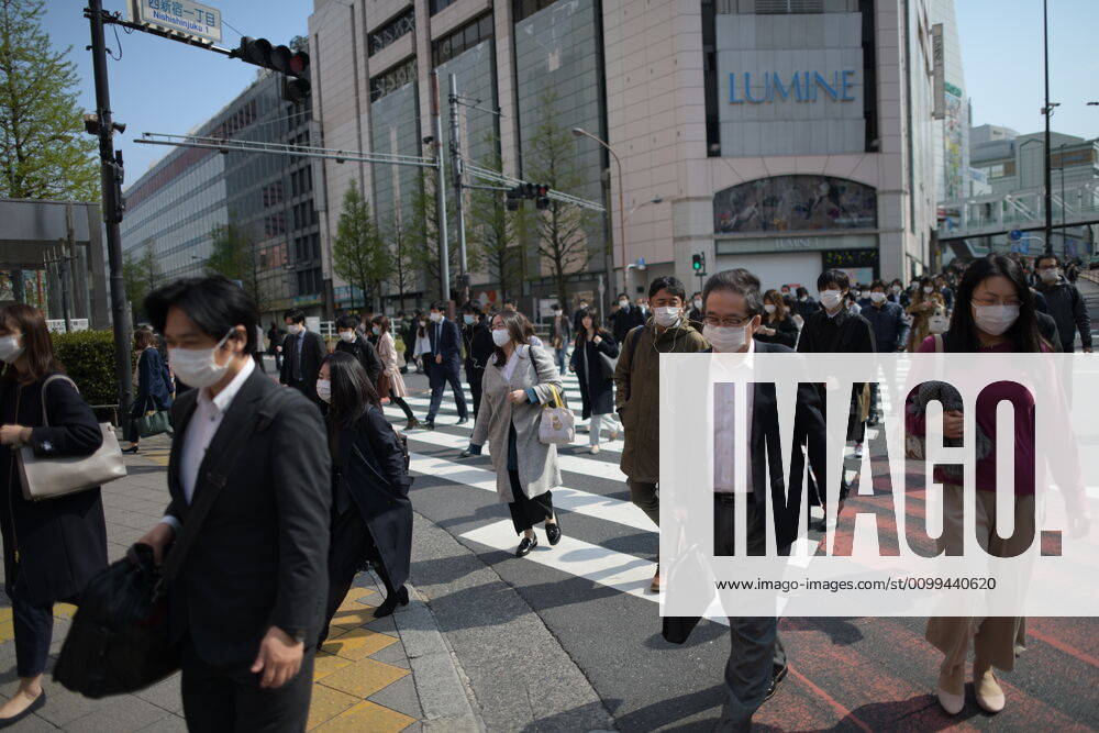 Commuters wearing face mask head to work early morning in Shinjuku, Tokyo on Friday, April 17, 2020. The Japanese government decided to expand the current areas under a state of emergency to nationwide, as the Covid-19 coronavirus outbreak continues to spread throughout the country. (Photo: Richard Atrero de Guzman AFLO) (125423716)