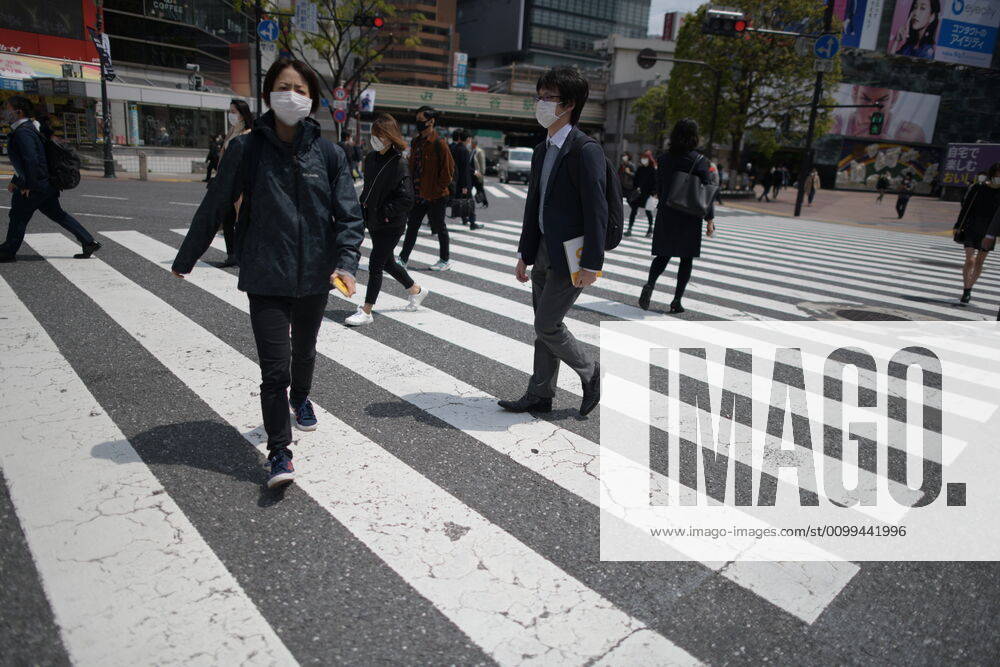 Commuters wearing face mask walks in near JR Shibuya Station in Tokyo on Friday, April 17, 2020. The Japanese government decided to expand the current areas under a state of emergency to nationwide, as the Covid-19 coronavirus outbreak continues to spread throughout the country. (Photo: Richard Atrero de Guzman AFLO) (125430359)