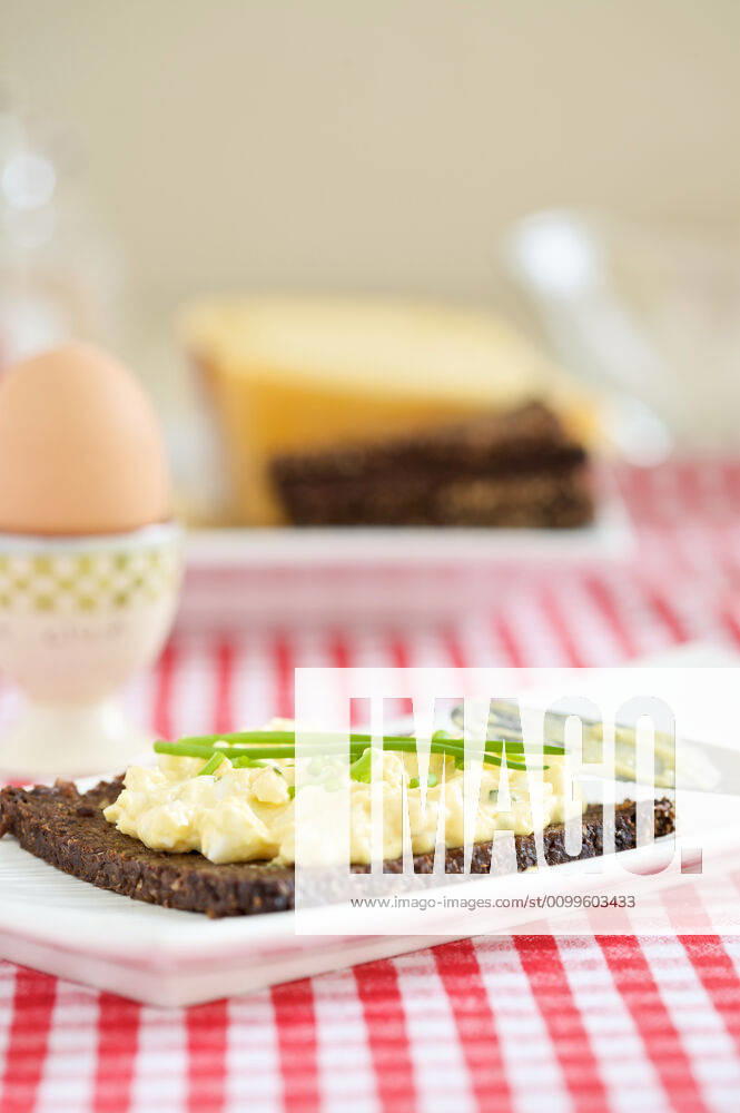 Healthy breakfast Egg-salad on whole wheat rye toast on the breakfast table