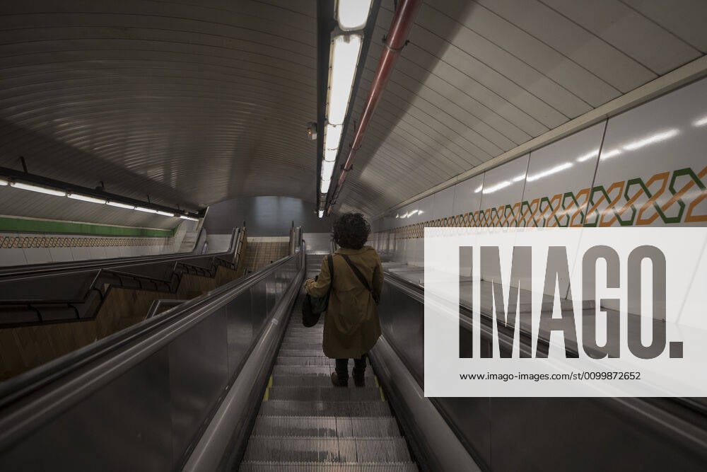 A woman using the empty access escalators of the Madrid Metro Station during the covid 19 crisis..Day 41 of the state of alarm due to the Coronavirus health crisis. Spain has had more than 200,000 confirmed cases of COVID-19 and over 20,000 reported deaths. Daily deaths from coronavirus have dropped in the last 24 hours to 367, the lowest rate in a month. Madrid Spain - ZUMAs197 20200424_zaa_s197_116