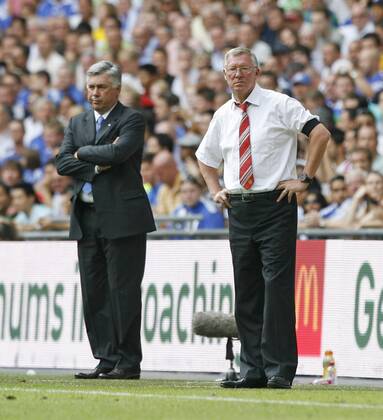 Manchester United s Sir Alex Ferguson (R) and Chelsea s Carlo Ancelotti - Community Shield EDITORIAL USE ONLY. No use with unauthorised audio, video, data, fixture lists, club league logos or live services. Online in-match use limited to 120 images, no video emulation. No use in betting, games or single club league player publications. o0 FC - ManU, Trainer