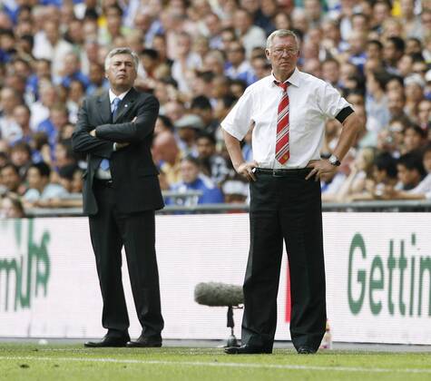 Manchester United s Sir Alex Ferguson watches on with Chelsea s Carlo Ancelotti - Community Shield EDITORIAL USE ONLY. No use with unauthorised audio, video, data, fixture lists, club league logos or live services. Online in-match use limited to 120 images, no video emulation. No use in betting, games or single club league player publications. o0 FC - ManU, Trainer