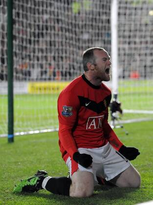 Wayne Rooney of Manchester United celebrates the second goal --- Premier League: Hull City (orange) vs. Manchester United (red), 27th December, 2009 EDITORIAL USE ONLY. No use with unauthorised audio, video, data, fixture lists, club league logos or live services. Online in-match use limited to 120 images, no video emulation. No use in betting, games or single club league player publications. o0 Jubel Freude