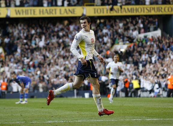 Tottenham s Gareth Bale celebrates scoring his sides second goal - Barclays Premier League --- Tottenham Hotspur (white) v FC Chelsea (blue) --- 17th April, 2010 EDITORIAL USE ONLY. No use with unauthorised audio, video, data, fixture lists, club league logos or live services. Online in-match use limited to 120 images, no video emulation. No use in betting, games or single club league player publications.