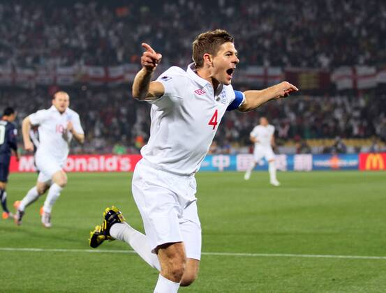 England s Steven Gerrard celebrates scoring his sides opening goal FIFA World Cup 2010 Group C England v USA 12th June, 2010 EDITORIAL USE ONLY. No use with unauthorised audio, video, data, fixture lists, club league logos or live services. Online in-match use limited to 120 images, no video emulation. No use in betting, games or single club league player publications.