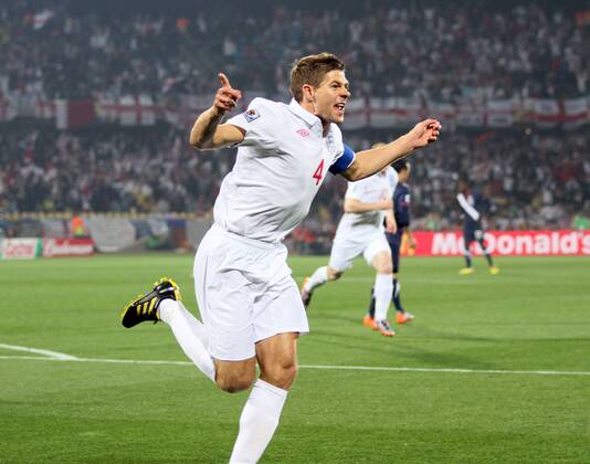 England s Steven Gerrard celebrates scoring his sides opening goal FIFA World Cup 2010 Group C England v USA 12th June, 2010 EDITORIAL USE ONLY. No use with unauthorised audio, video, data, fixture lists, club league logos or live services. Online in-match use limited to 120 images, no video emulation. No use in betting, games or single club league player publications.
