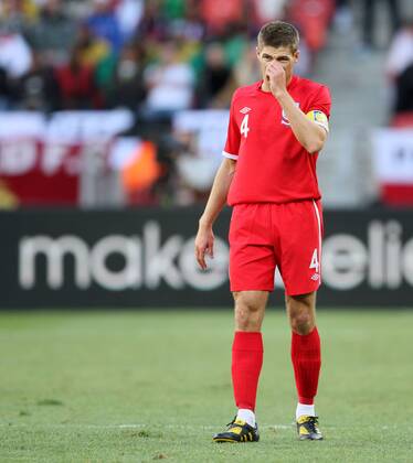 England s Steven Gerrard looks on dejected Slovenia v England 23rd June, 2010 EDITORIAL USE ONLY. No use with unauthorised audio, video, data, fixture lists, club league logos or live services. Online in-match use limited to 120 images, no video emulation. No use in betting, games or single club league player publications.