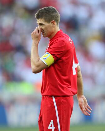 England s Steven Gerrard looks on dejected Slovenia v England 23rd June, 2010 EDITORIAL USE ONLY. No use with unauthorised audio, video, data, fixture lists, club league logos or live services. Online in-match use limited to 120 images, no video emulation. No use in betting, games or single club league player publications.