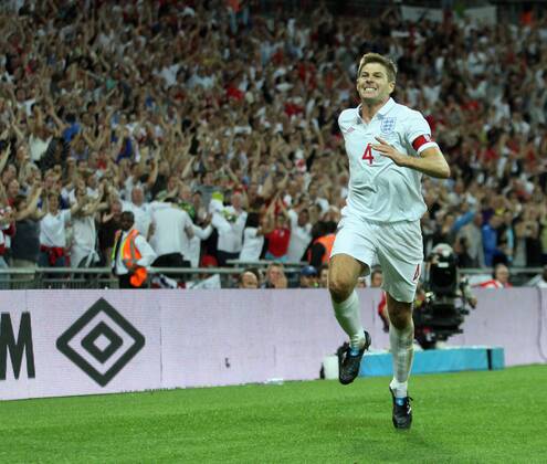 England s Steven Gerrard celebrates scoring his sides second goal International Friendly England v Hungary 11th August, 2010 EDITORIAL USE ONLY. No use with unauthorised audio, video, data, fixture lists, club league logos or live services. Online in-match use limited to 120 images, no video emulation. No use in betting, games or single club league player publications.